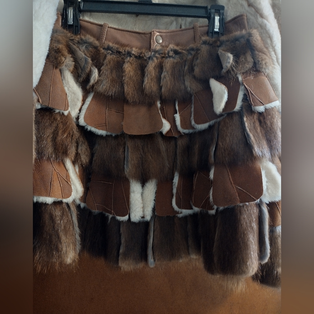 I'm selling a custom-made for Beaver and fox jacket and skirt size 7 custom made